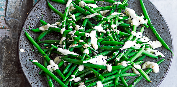 Green beans with confit garlic and tahini dressing