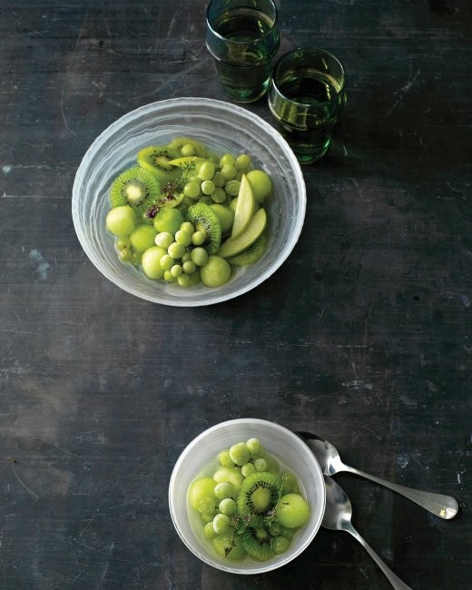 Green fruit bowl with frozen grapes