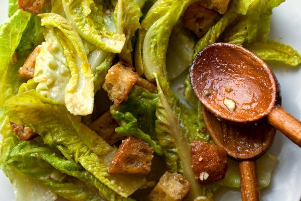Green garlic Caesar salad with anchovy croutons