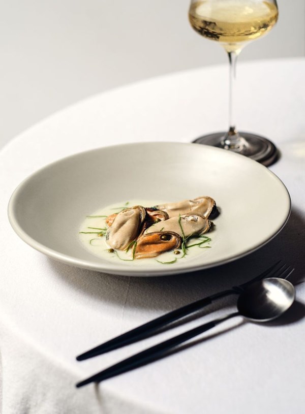 Green-lipped mussels steamed in cider with green peppercorn and sorrel
