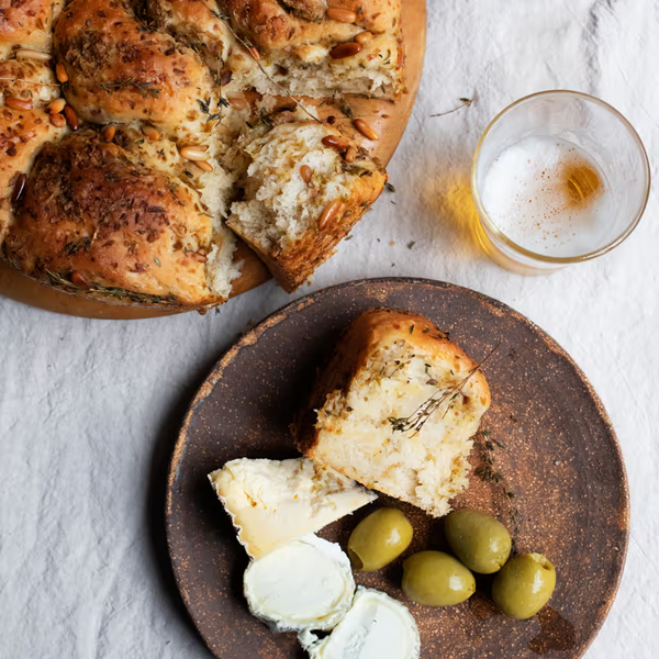 Green olive, thyme and pine-nut buns