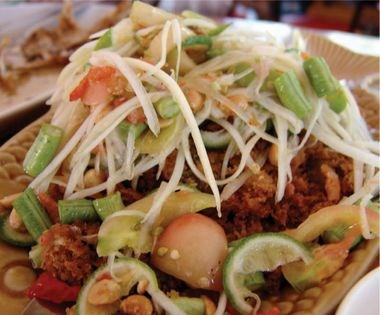 Green papaya salad with long bean, limes, roasted peanuts and sticky rice (Som tum)
