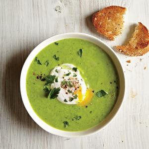 Green pea and asparagus soup with poached eggs and toast