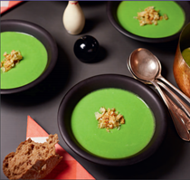 Green pea and ham hock soup with crackling crumbs
