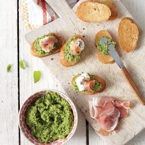 Green pea pesto crostini with prosciutto