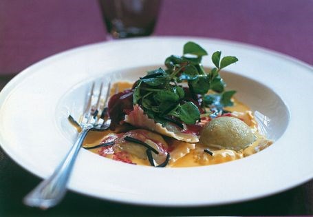 Green pea ravioli with saffron butter and truffled beetroot salad