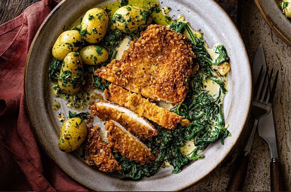 Green peppercorn chicken schnitzel with sherry-laced creamed spinach