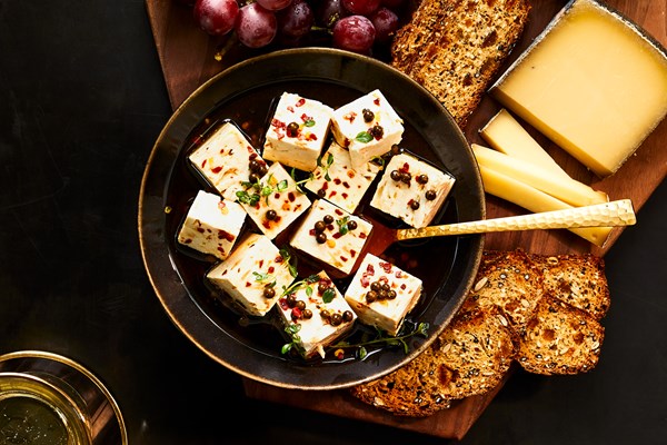 Green peppercorn-marinated feta