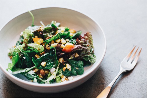 Green salad of nectarines, corn & peanuts