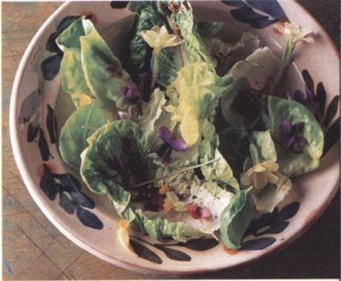 Green salad with spring flowers