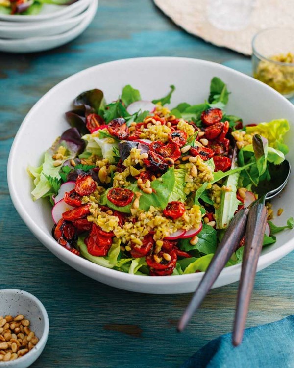 Green salad with thyme-roasted cherry tomatoes & green olive dressing