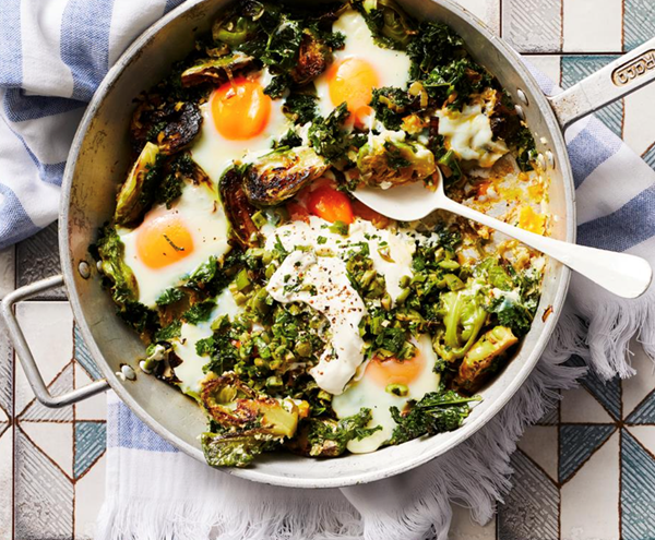 Green shakshuka with Brussels sprouts, olives and labne