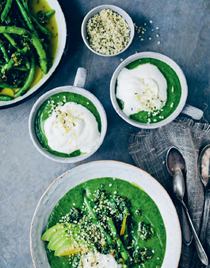 Green soup with clouds of cream