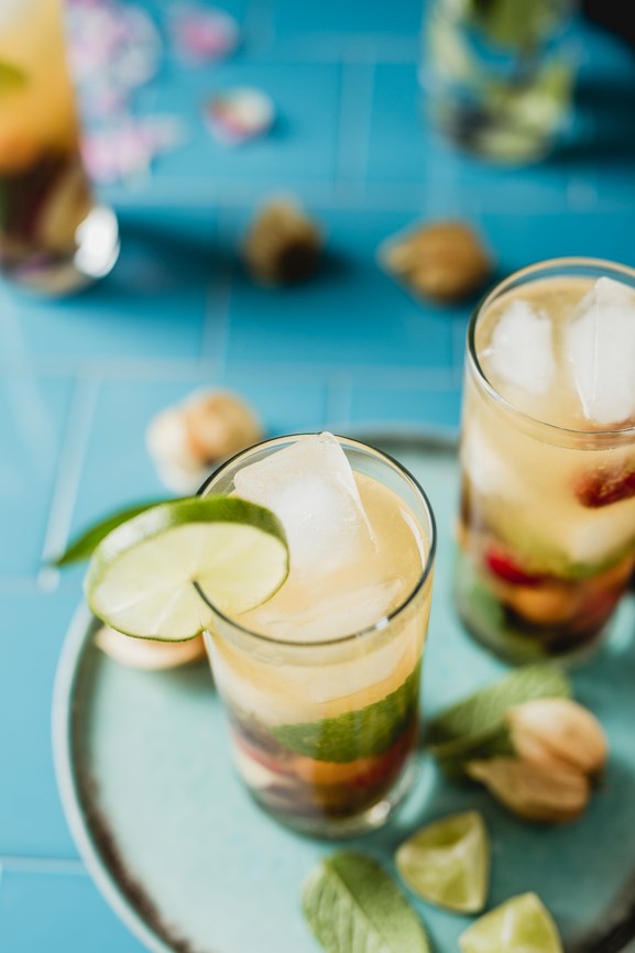 Green tea cooler with ginger, papaya, and lime
