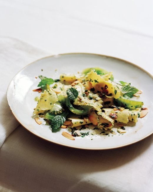 Green tomatoes with pasta, mint, and toasted almonds