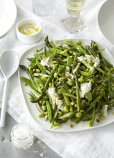 Green vegetable salad with hazelnuts and cranberries