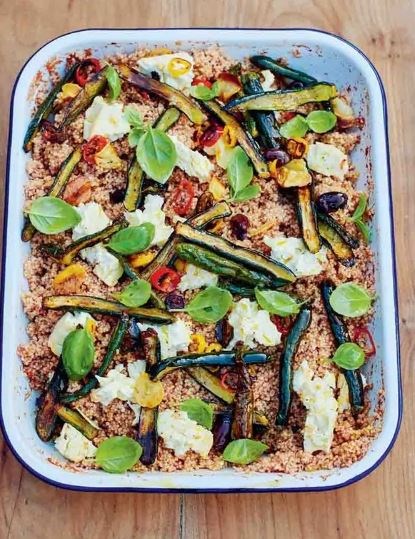 Greenhouse couscous salad with garlicky roasted courgette, feta & chilli