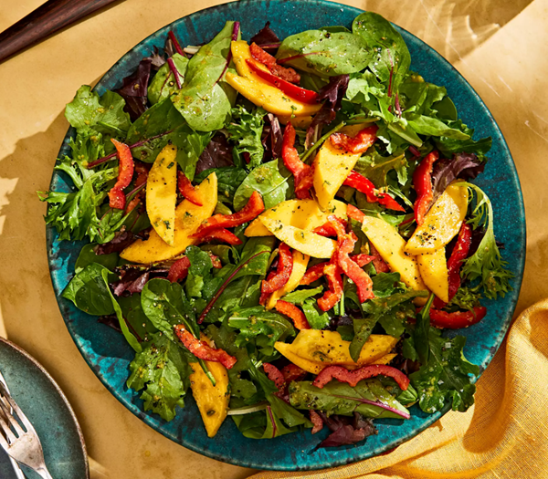 Greens & mango salad with ginger-raisin vinaigrette