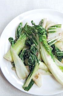 Greens dressed with walnut tarator