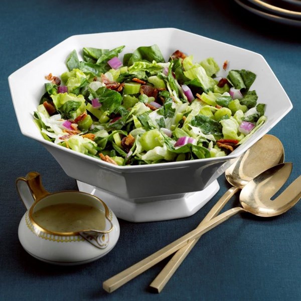 Greens with hot bacon dressing
