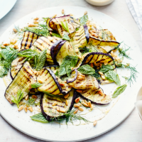 Griddled aubergines with tarator sauce and pine nuts