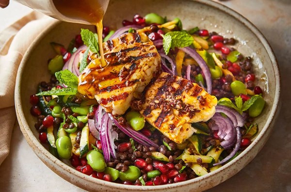 Griddled harissa halloumi with lentil, pomegranate, courgette & mint