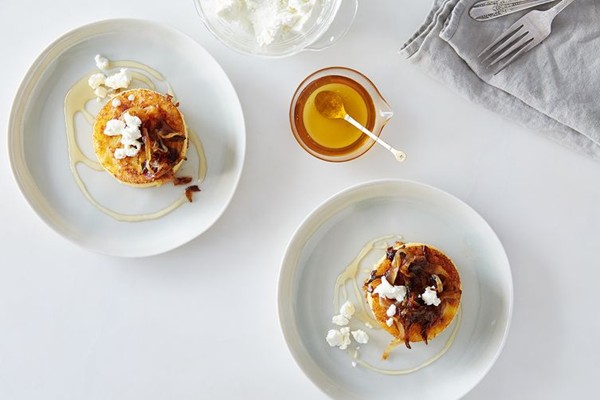 Griddled polenta cakes with caramelized onions, goat cheese, and honey