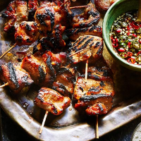 Griddled pork skewers with spicy moo ping sauce