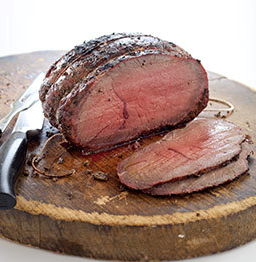 Grill-roasted beef with garlic and rosemary