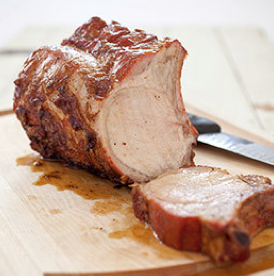 Grill-roasted bone-in pork rib roast