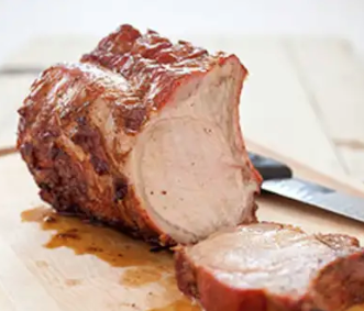 Grill-roasted bone-in pork rib roast