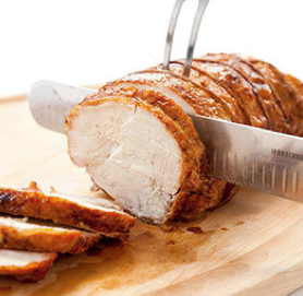 Grill-roasted boneless turkey breast with herb butter