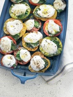 Grill-roasted tomatoes topped with cheese and herbs