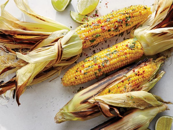 Grill-steamed corn with cilantro and chile flakes