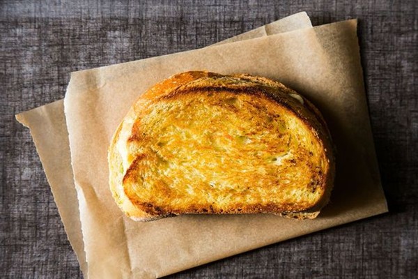 Grilled aged cheddar cheese sandwich with pistachio sage pesto