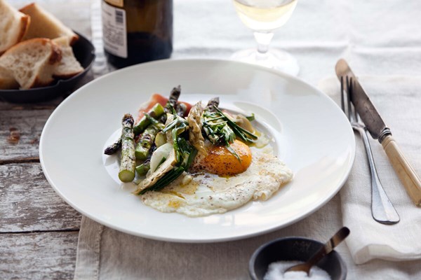 Grilled and pickled asparagus with prosciutto and fried eggs
