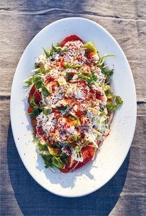 Grilled and raw tomatoes with cucumbers, yogurt, and all the herbs