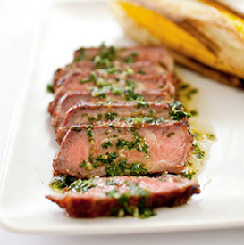 Grilled Argentine steaks with chimichurri sauce