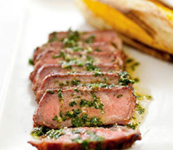 Grilled Argentine steaks with chimichurri sauce