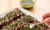 Grilled Argentine steaks with chimichurri sauce