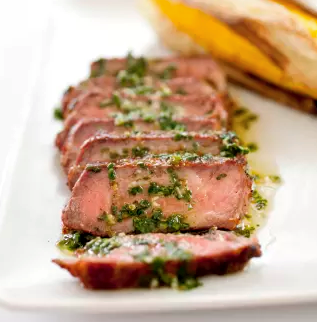 Grilled Argentine steaks with chimichurri