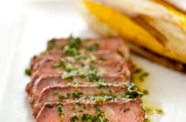 Grilled Argentinian steaks with chimichurri sauce