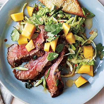 Grilled Asian flank steak with mango salad