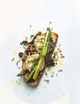 Grilled asparagus and goat's cheese with pine nuts and marjoram on pane Pugliese