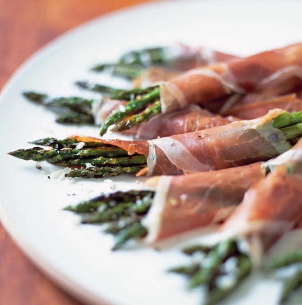 Grilled asparagus wrapped in prosciutto