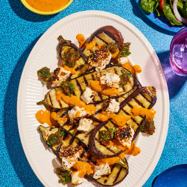 Grilled aubergine with grill-baked feta, harissa-tahini dressing and date salsa
