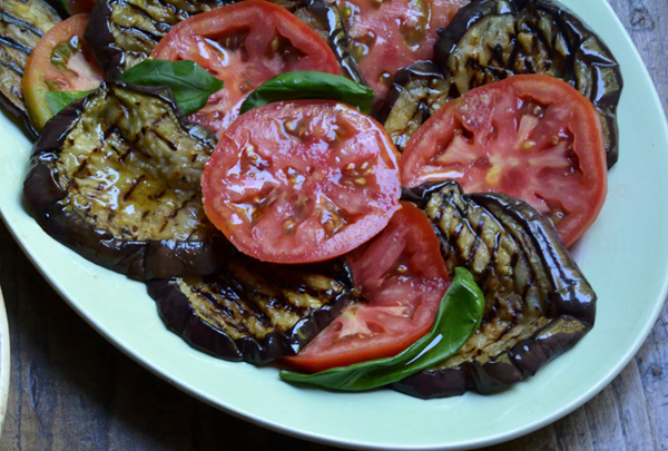 Grilled aubergine with tomato and basil
