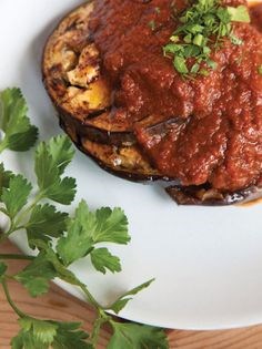 Grilled aubergine with tomato and garlic sauce