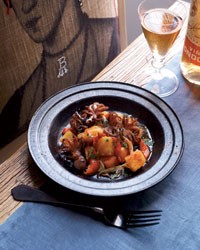 Grilled baby octopus with roasted peppers and potatoes
