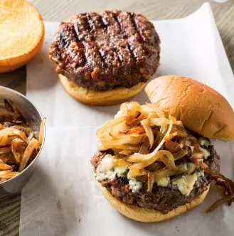 Grilled bacon burgers with caramelized onion